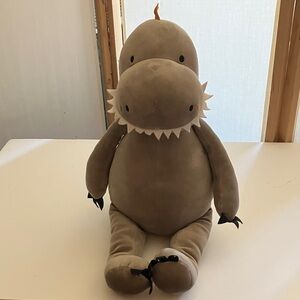 Bunnies by the Bay plush gray dinasaur.
